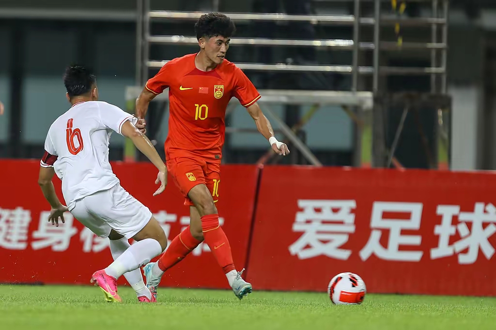 国际足球比赛中中国队取得关键胜利 国际足球比赛中中国队取得关键胜利